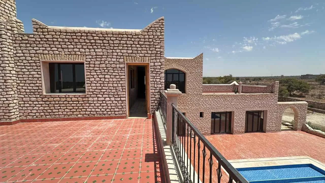 Backyard with landscaped garden and terrace