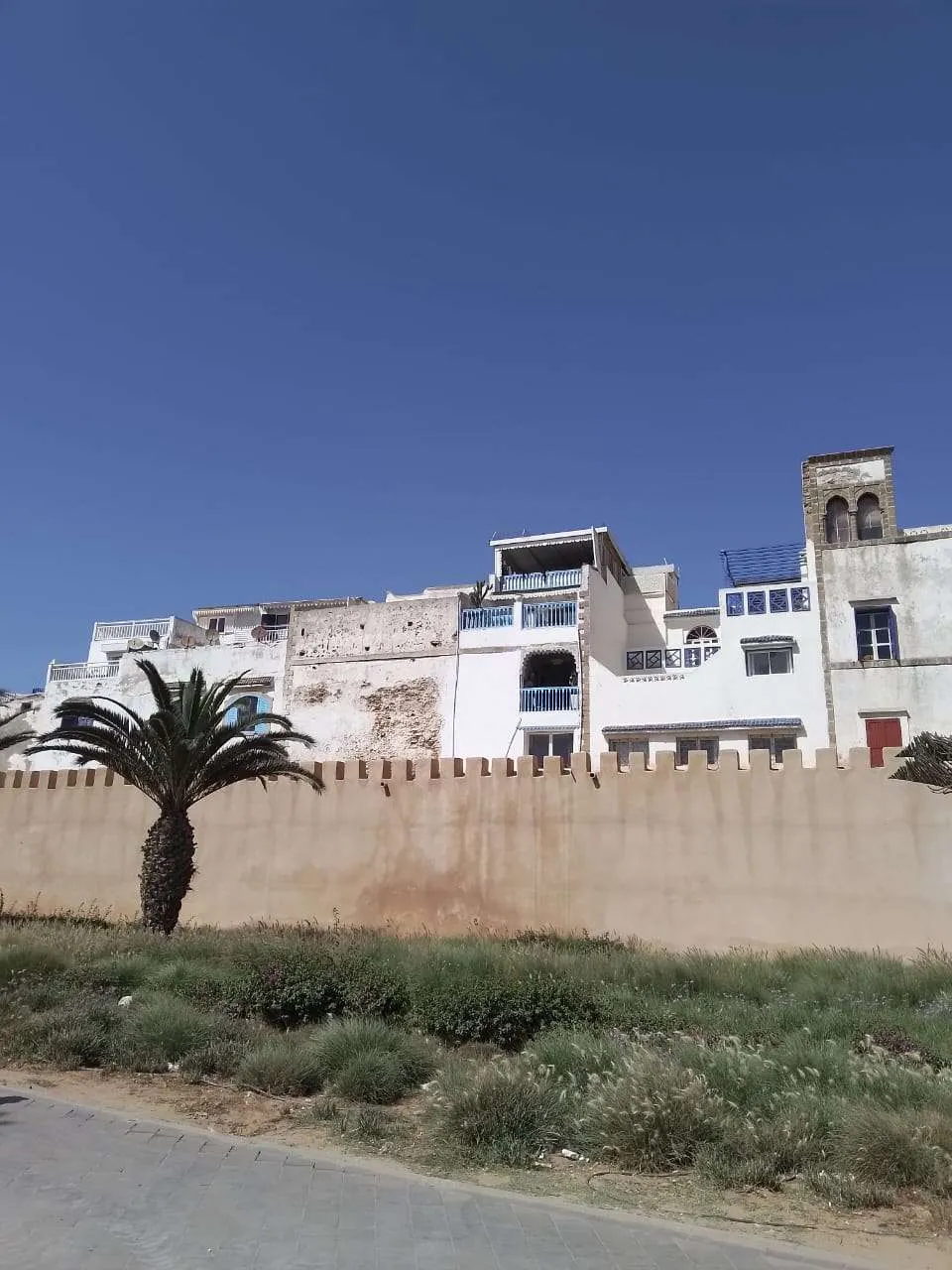 Facade of traditional riad near souks and city walls