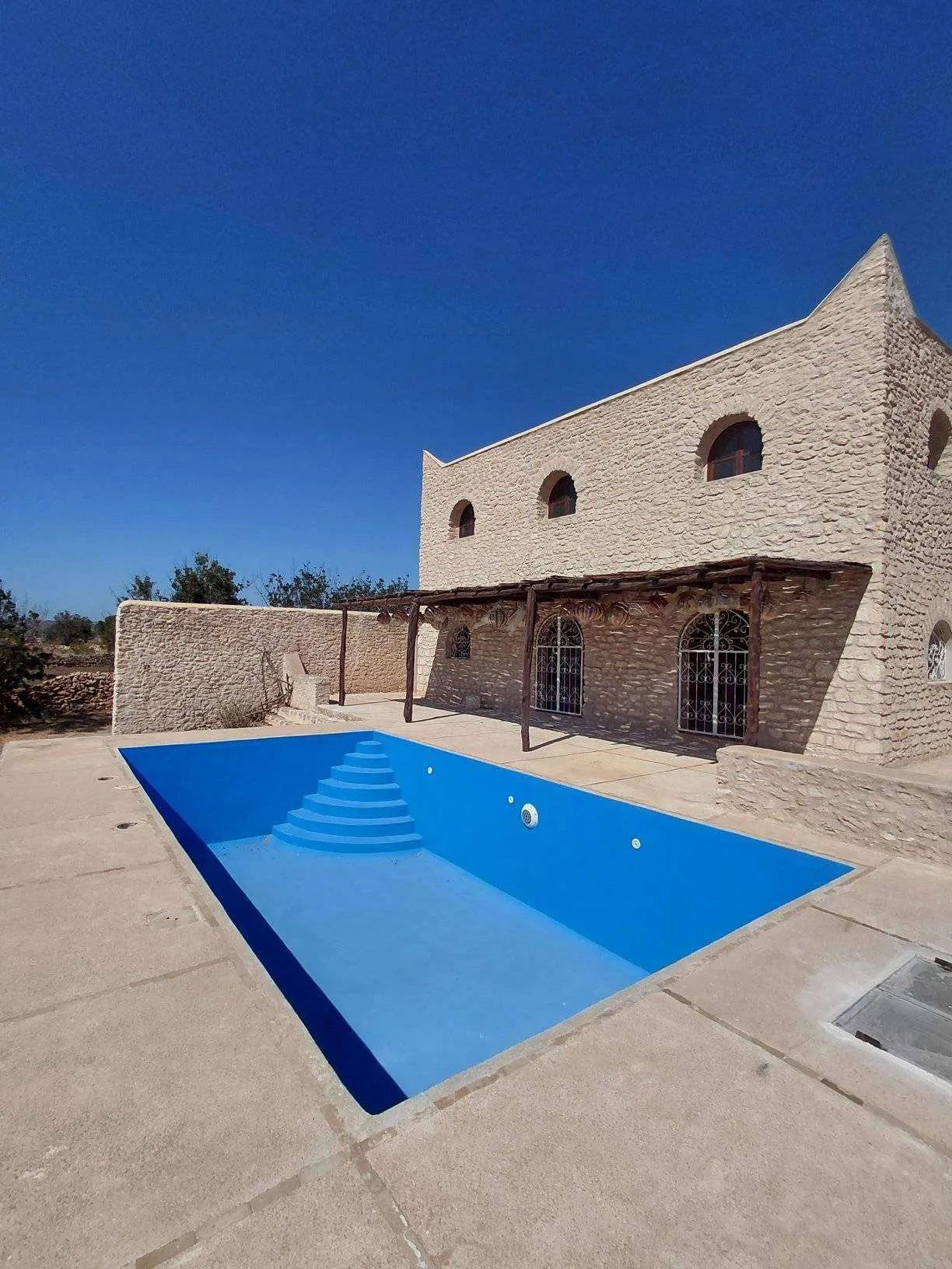 Front view of Villa Baldi in calm rural setting