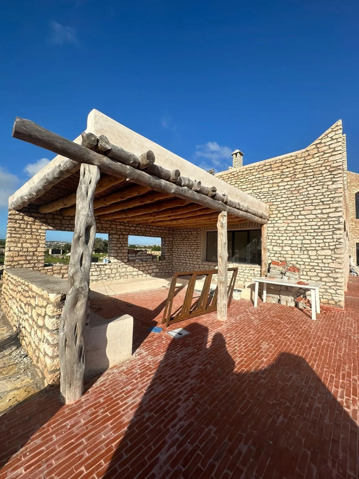 Outdoor summer kitchen and lounge area