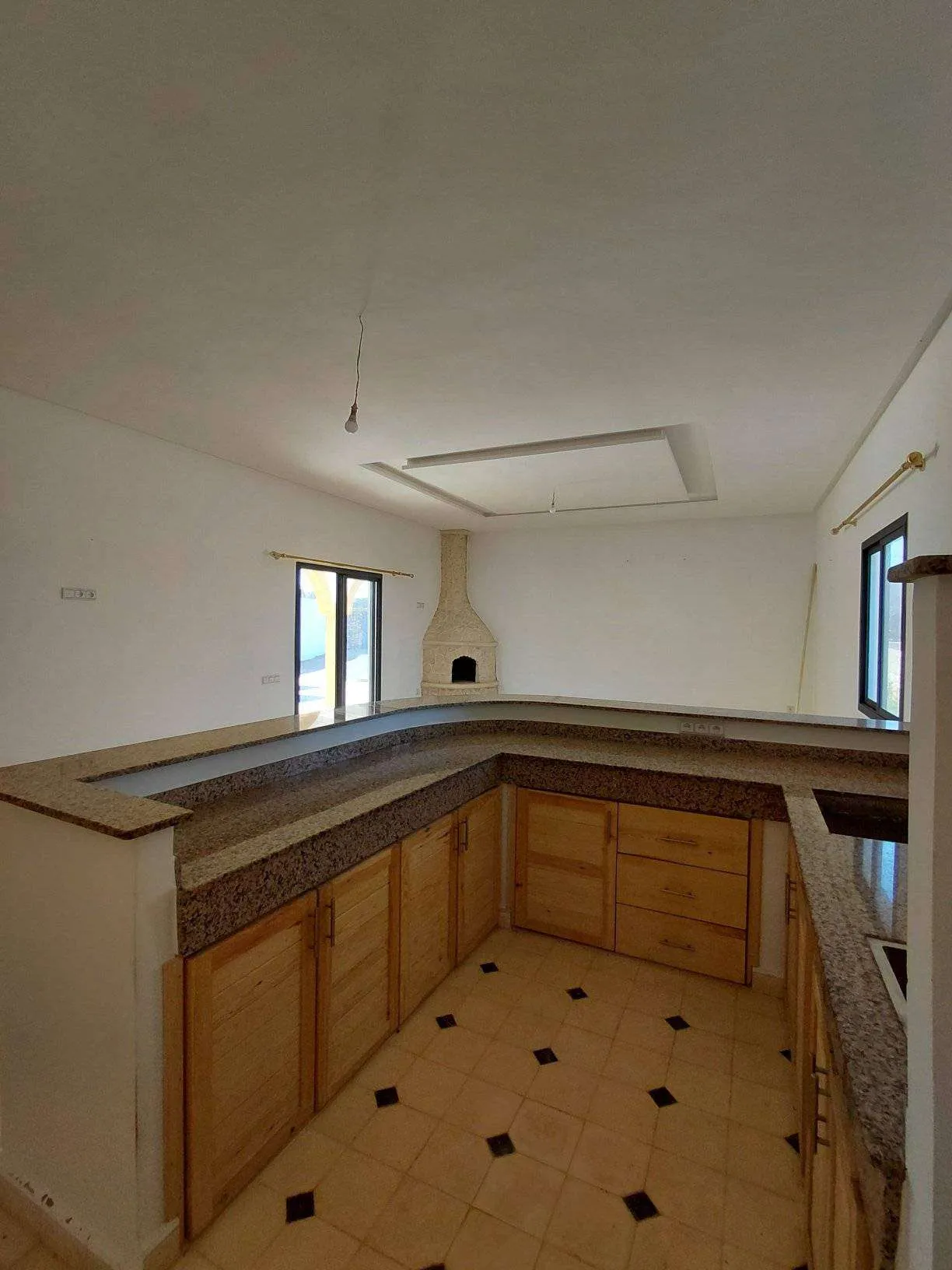 Second bedroom with ensuite bathroom and garden view