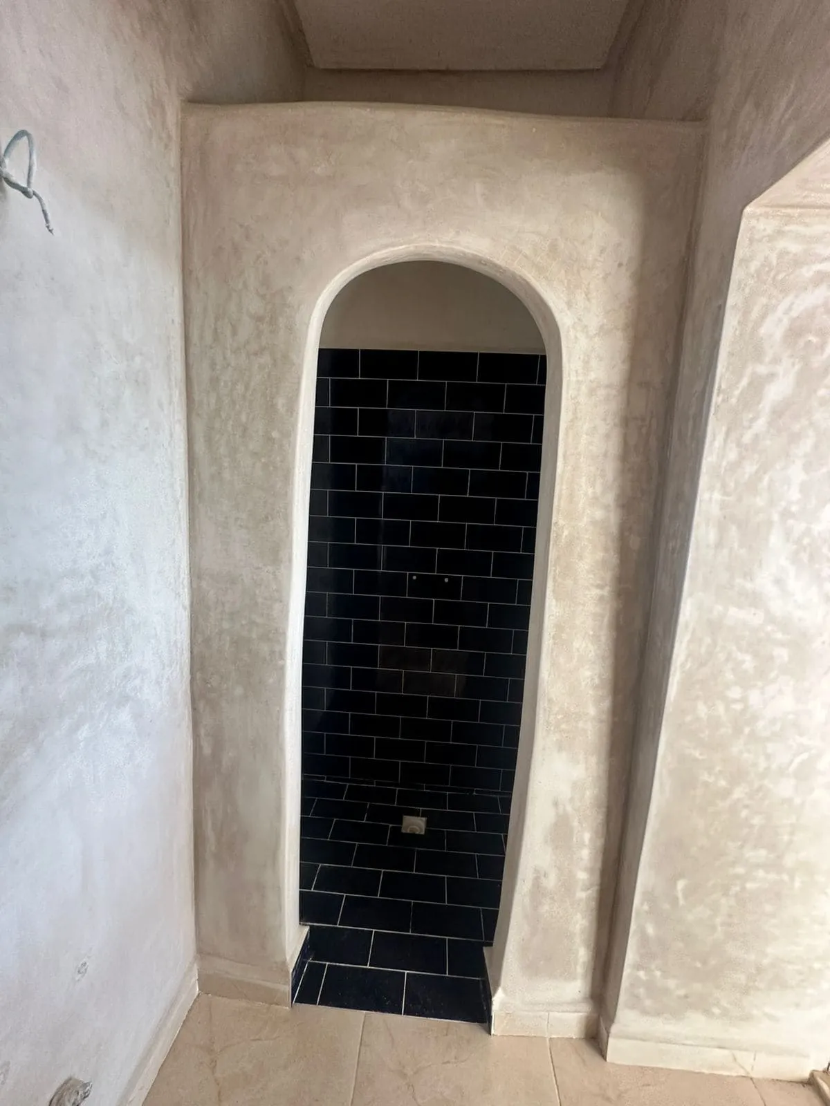 Sun terrace with pool view and lounge area