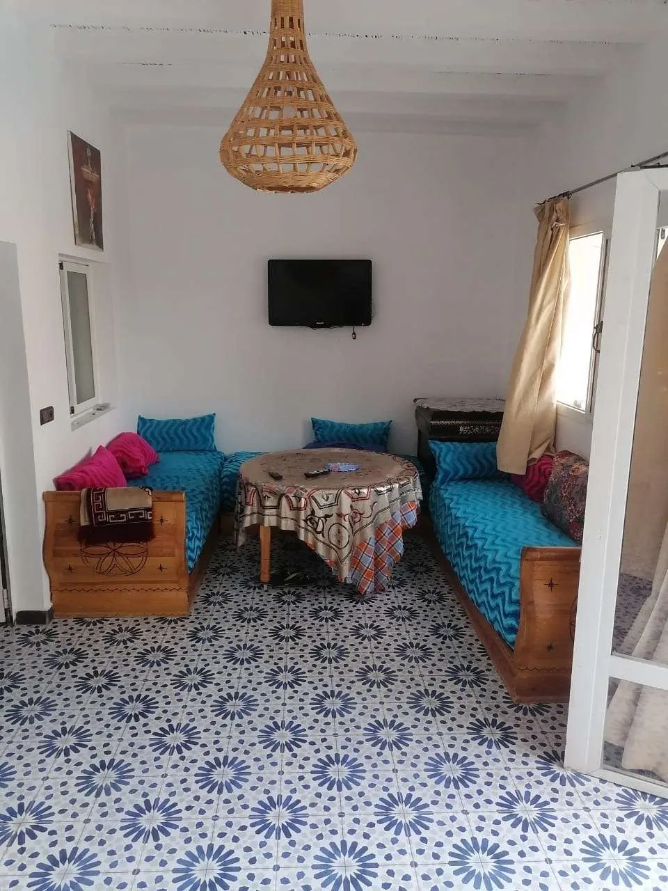 Bright living room open to outdoor spaces