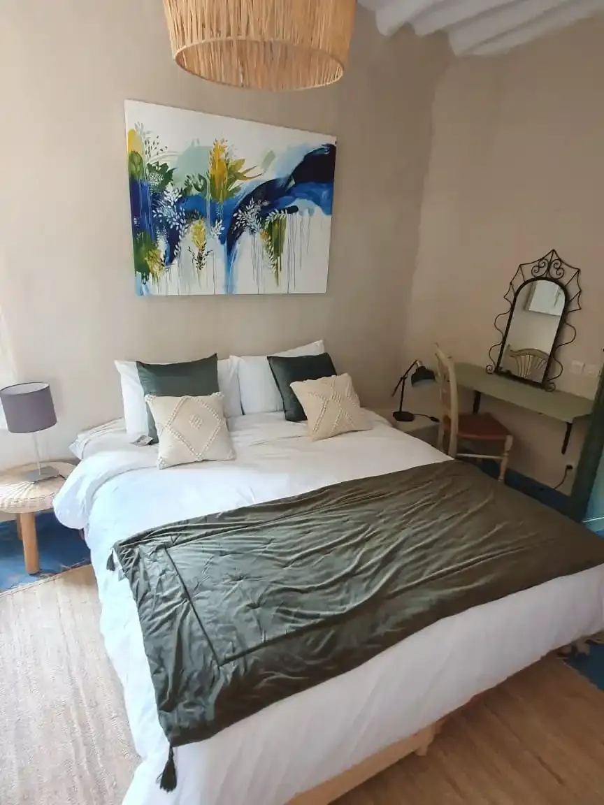 Central patio with century-old olive tree