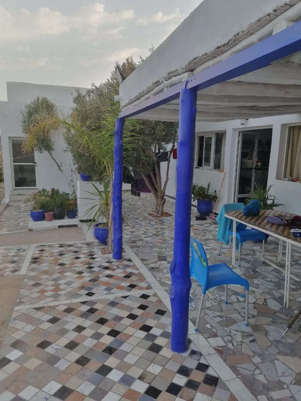 Entrance of the villa with surrounding peaceful environment