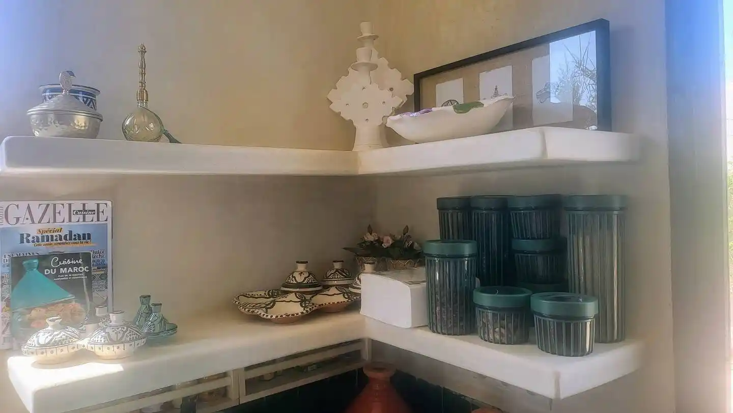 Living area connected to fully equipped kitchen