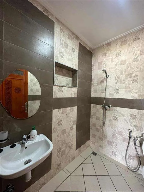 One of the five bedrooms with en-suite bathroom