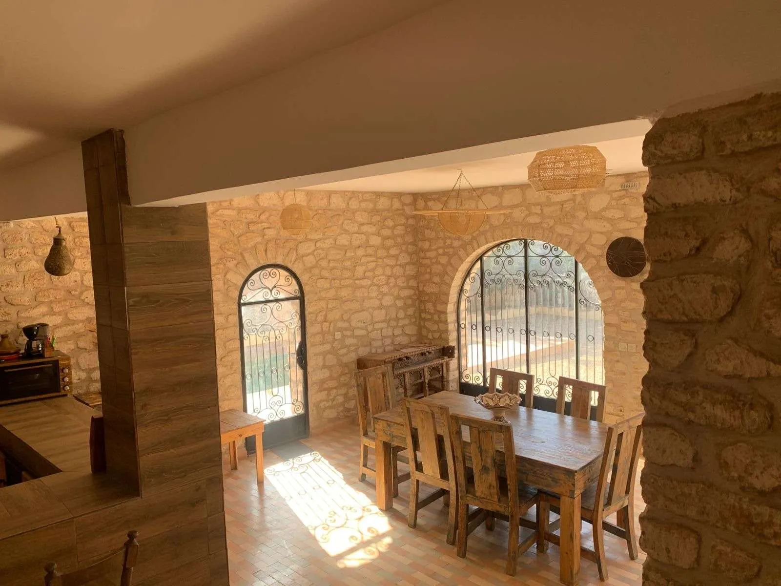 Pergola-covered terrace attached to the bungalow