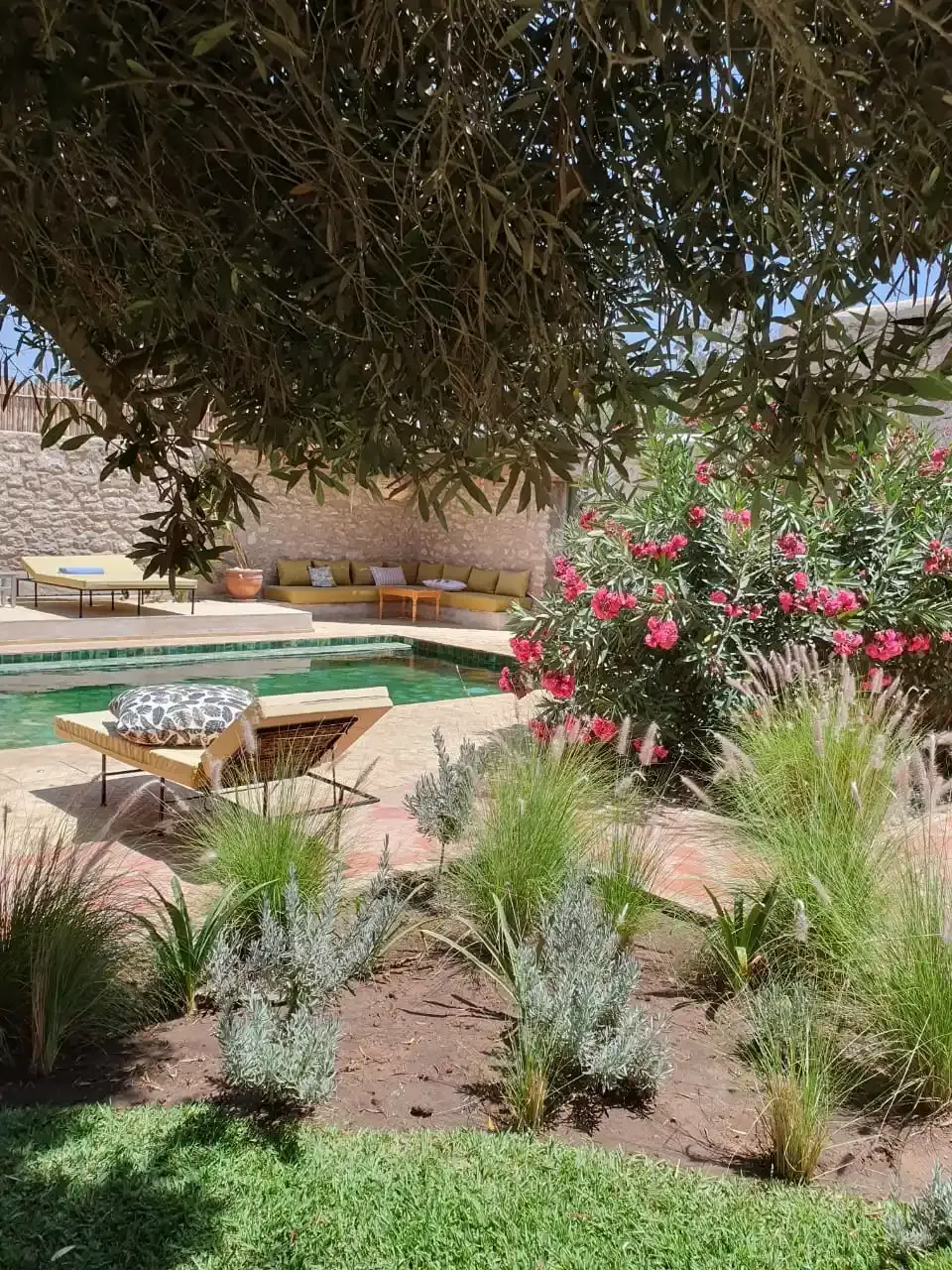 Poolside lounge area with outdoor seating