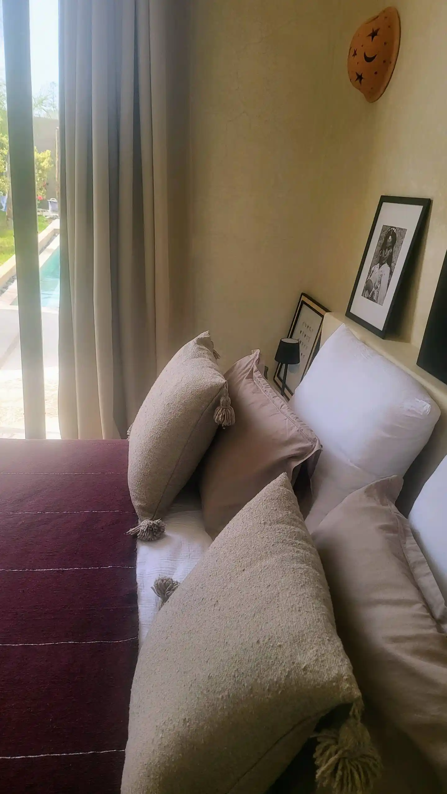 Private swimming pool surrounded by garden