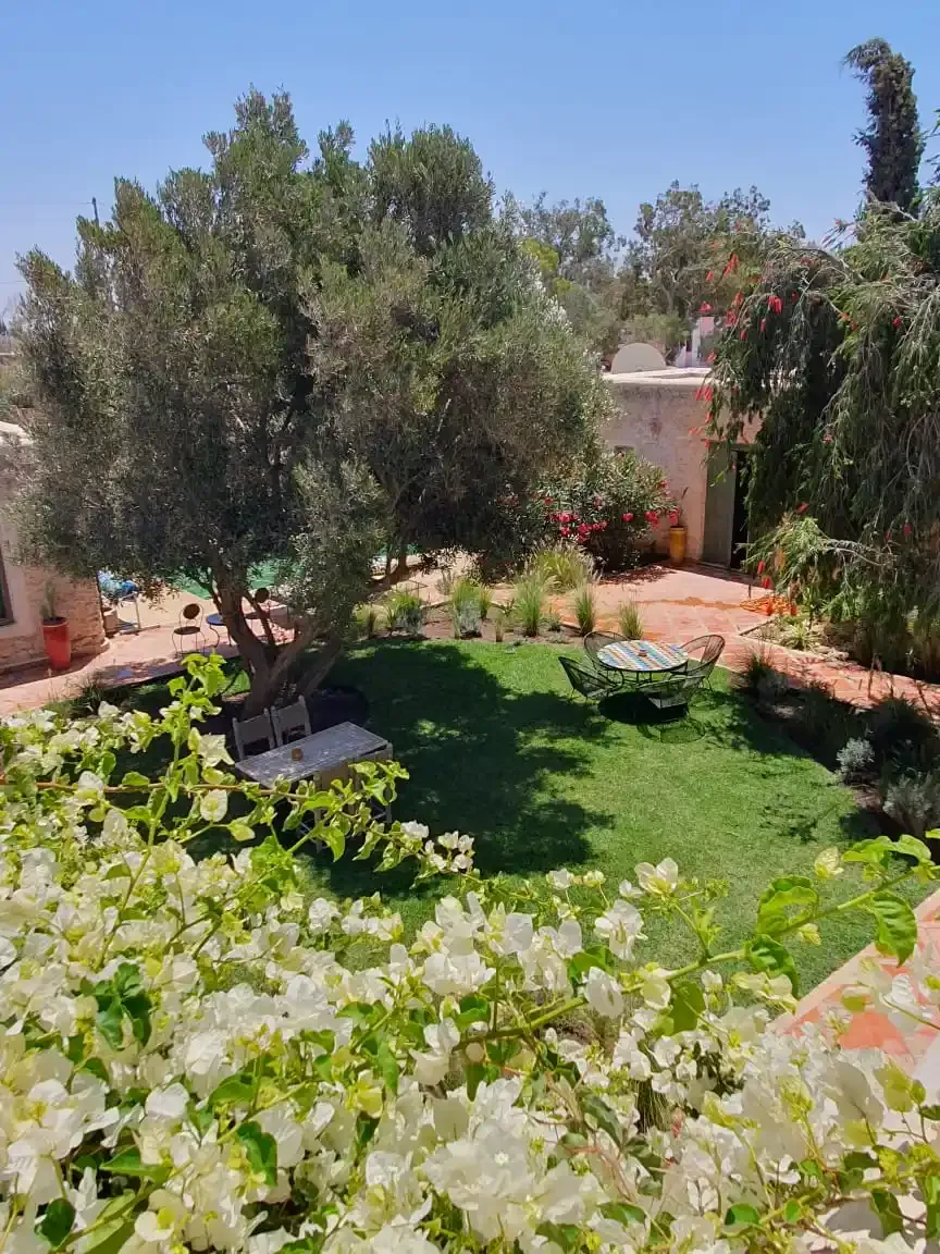 Villa exterior in calm countryside setting