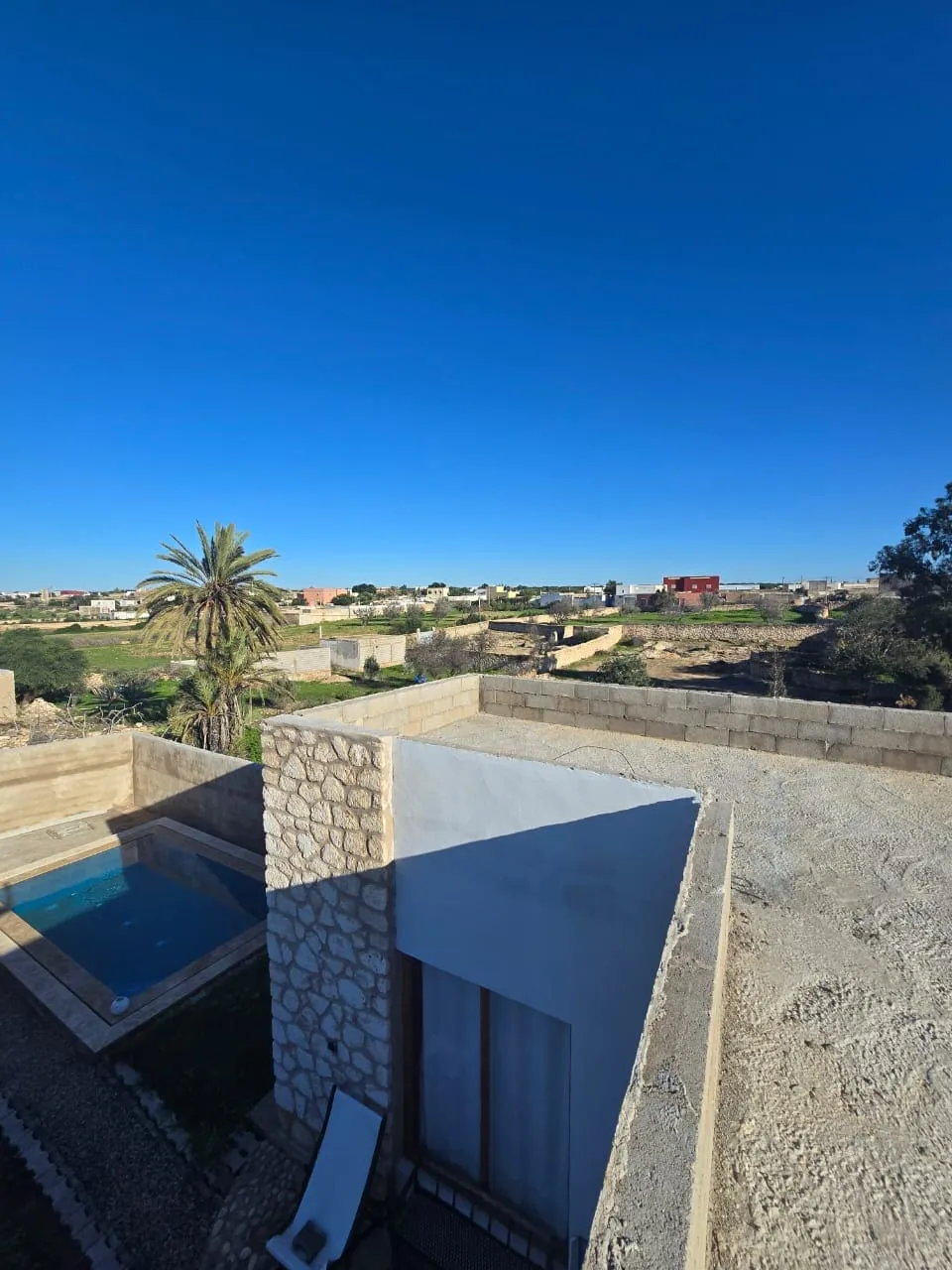 Villa exterior showing large outdoor living environment