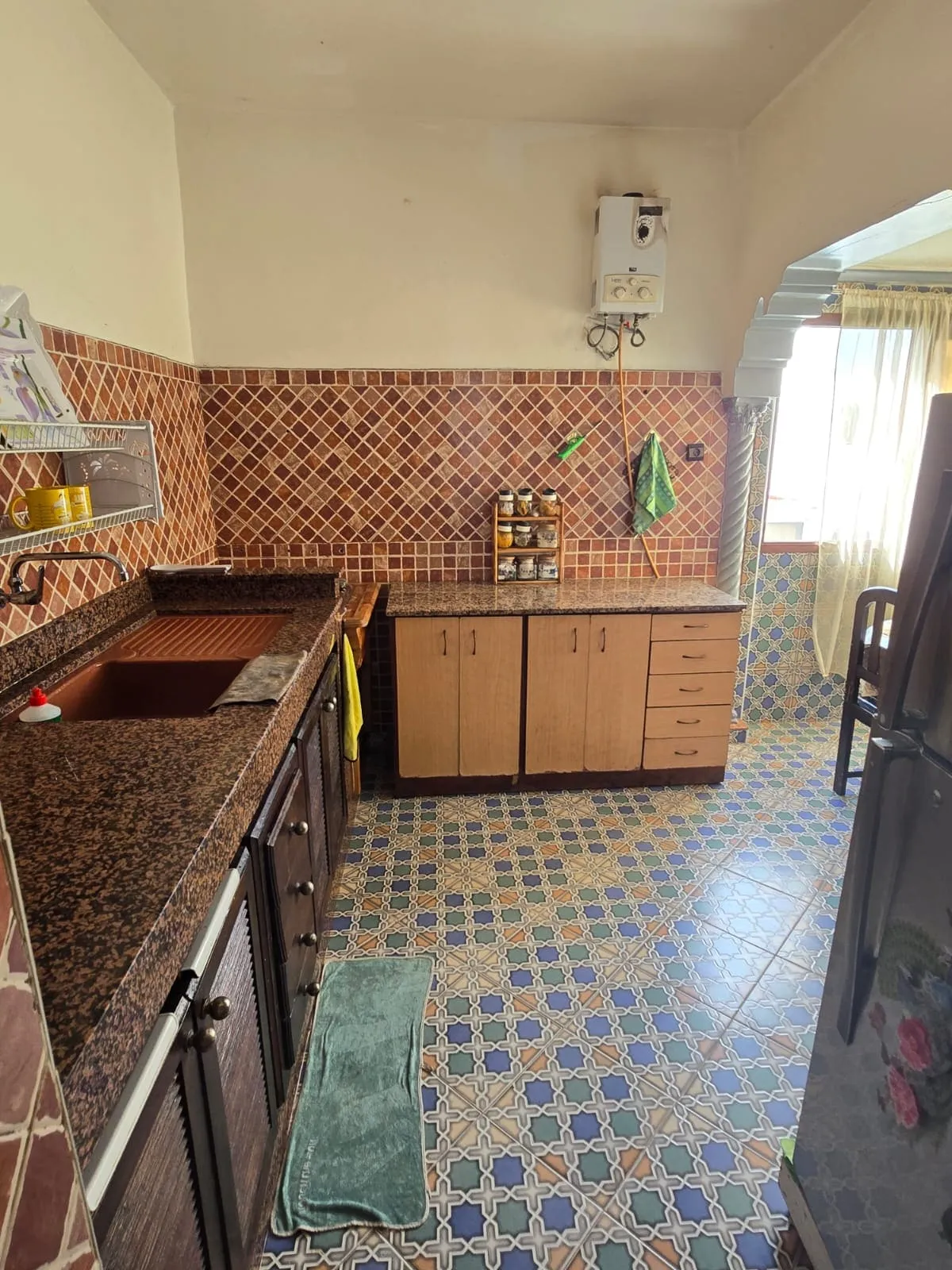 Functional kitchen in furnished apartment Essaouira Morocco