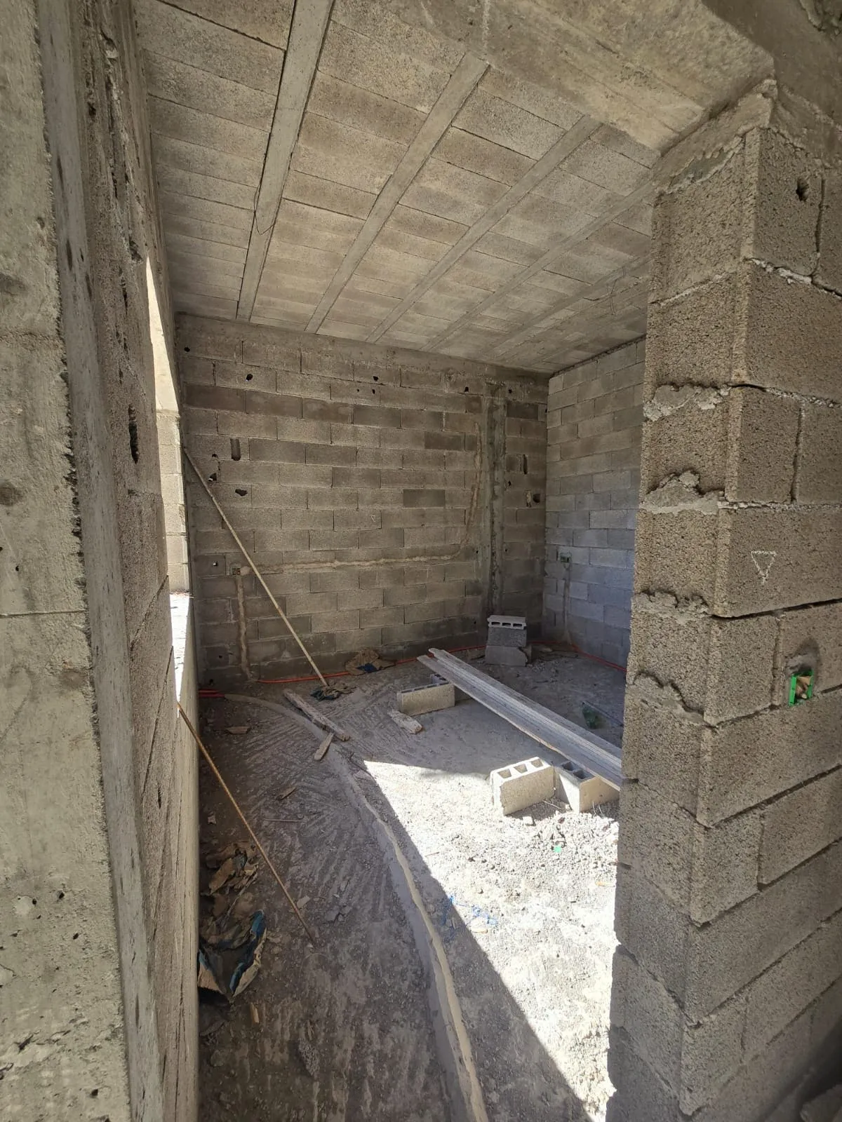 Interior circulation space of semi-finished villa in Ghazoua