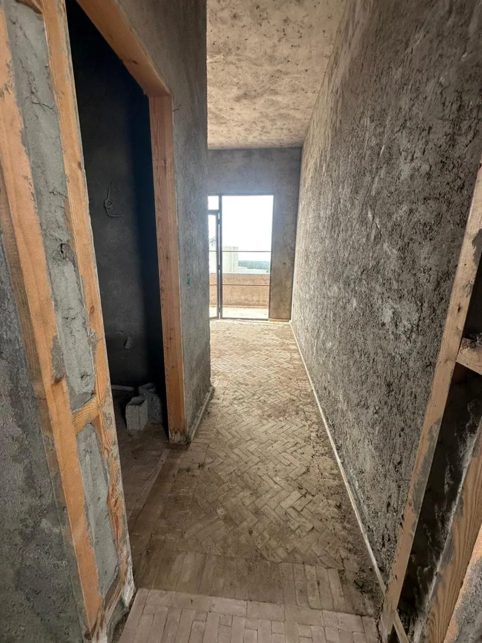 Outdoor relaxation area around swimming pool in Ghazoua villa