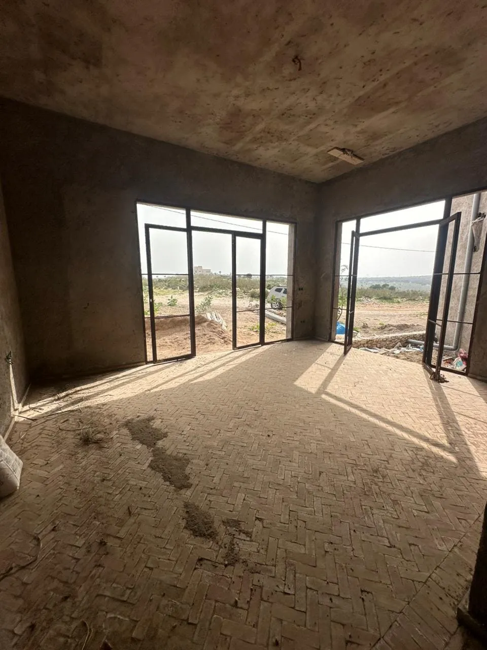 Poolside terrace with relaxing space in modern Ghazoua villa
