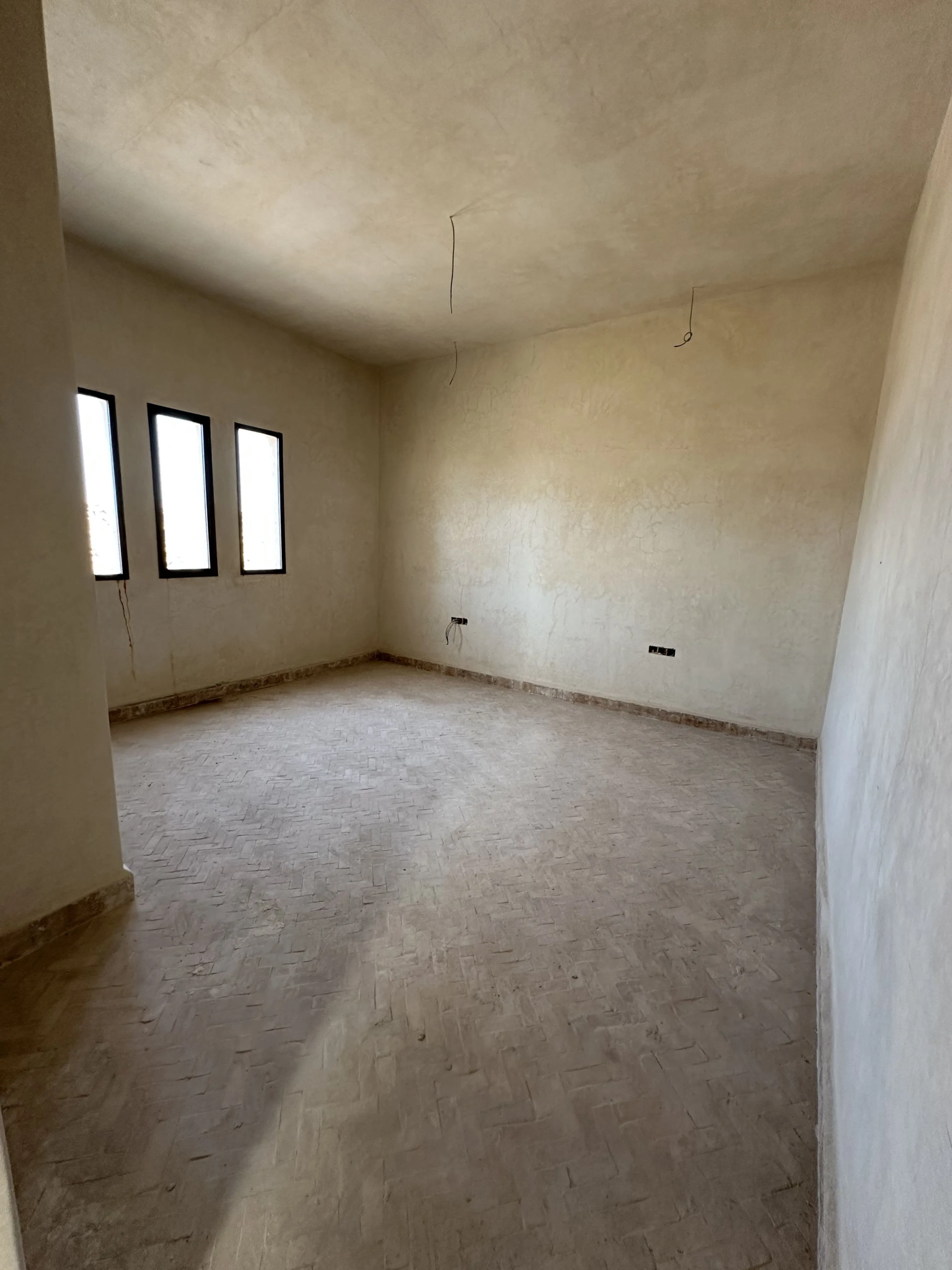 Bright bedroom with private bathroom in the villa in Ghazoua