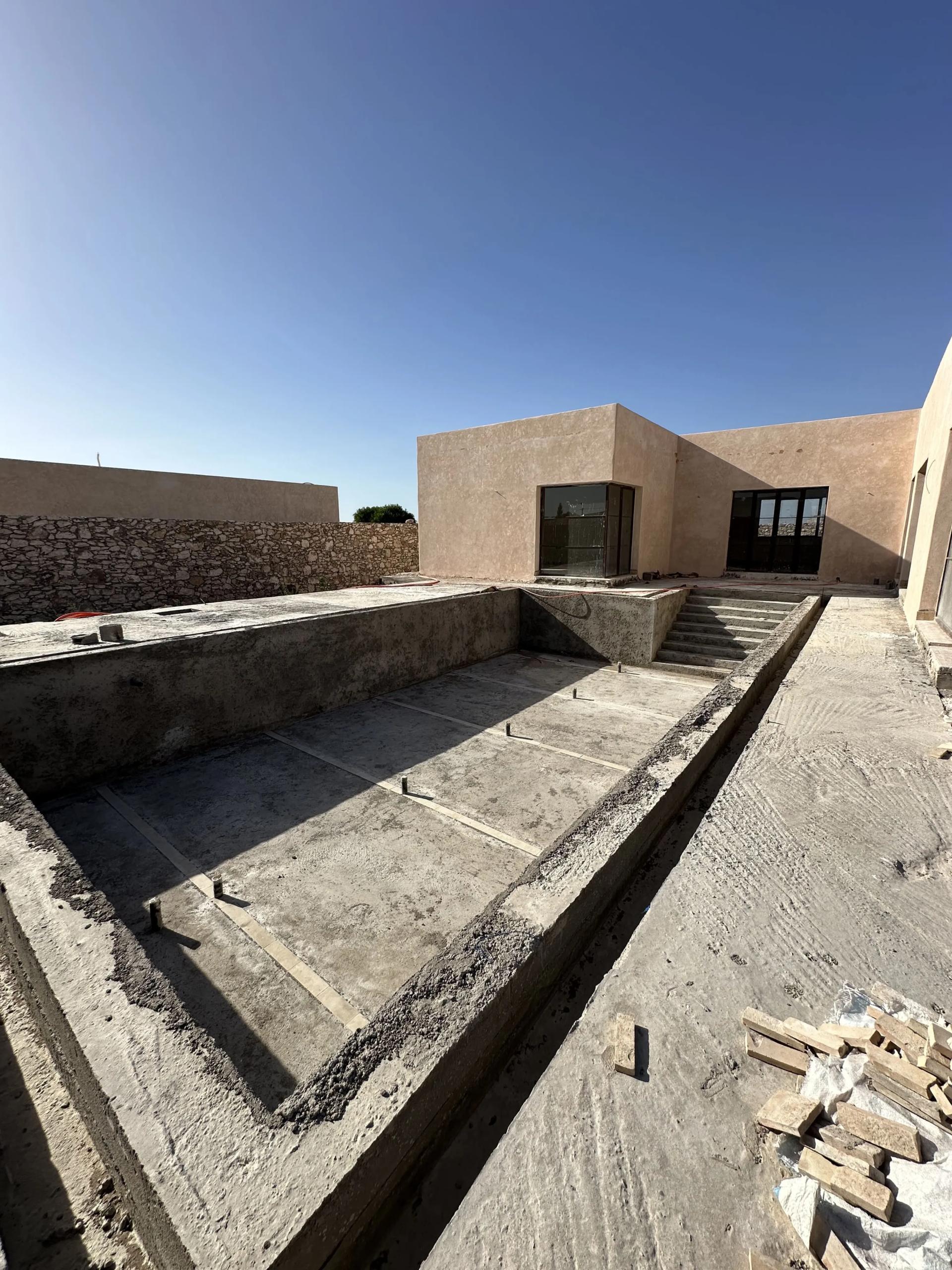 View of the swimming pool and outdoor areas of the villa in Ghazoua