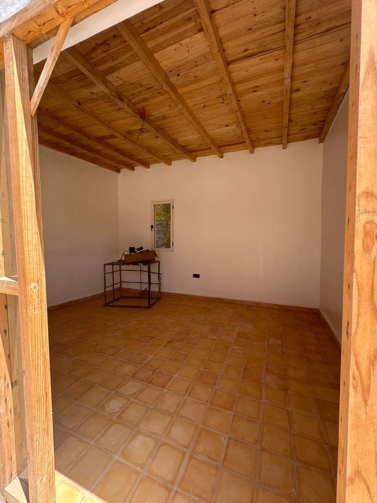 Spacious guest bedroom with pool view