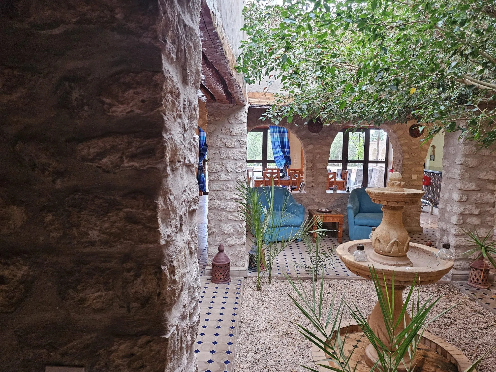 Decorative fountain in the central patio of the stone villa