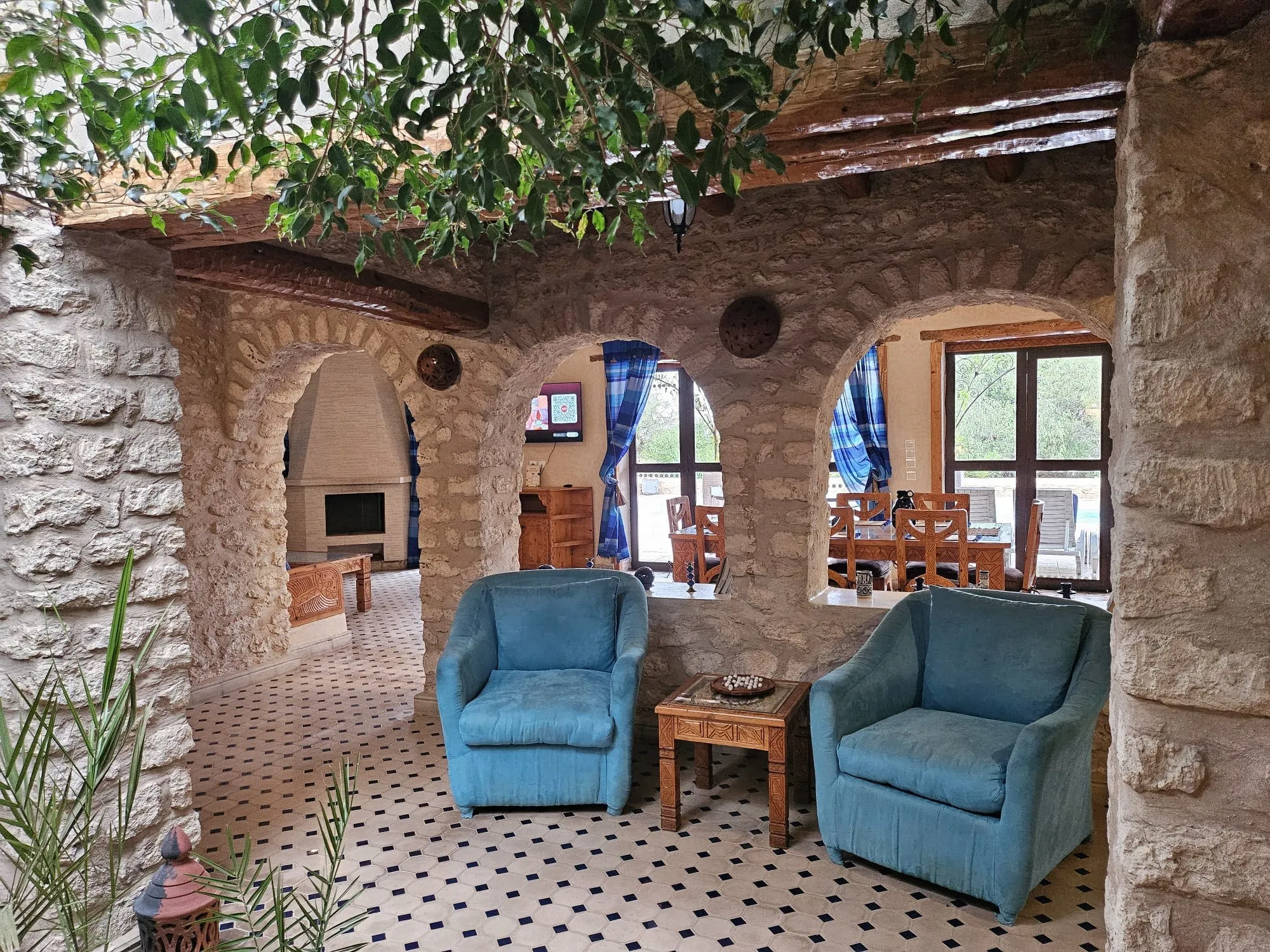 Outdoor armchair overlooking the peaceful garden and natural surroundings