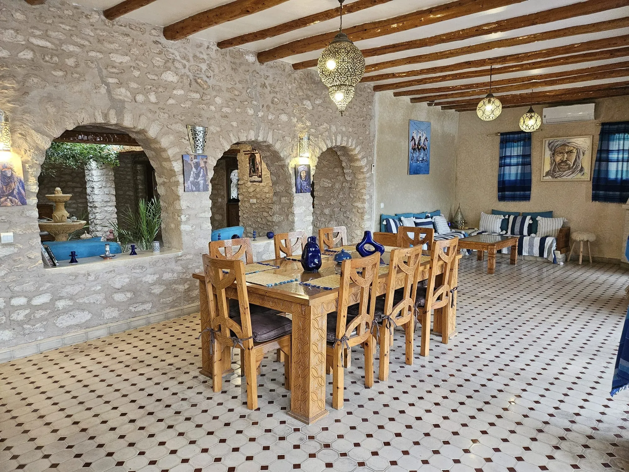 Spacious kitchen and dining area with natural stone details